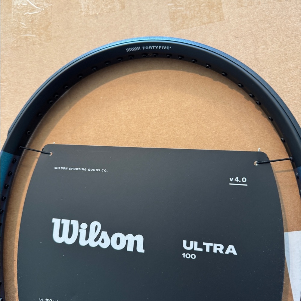 Wilson Ultra 100 v4 Racket in Black and Blue